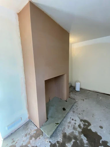 Plastered chimney breast and alcove